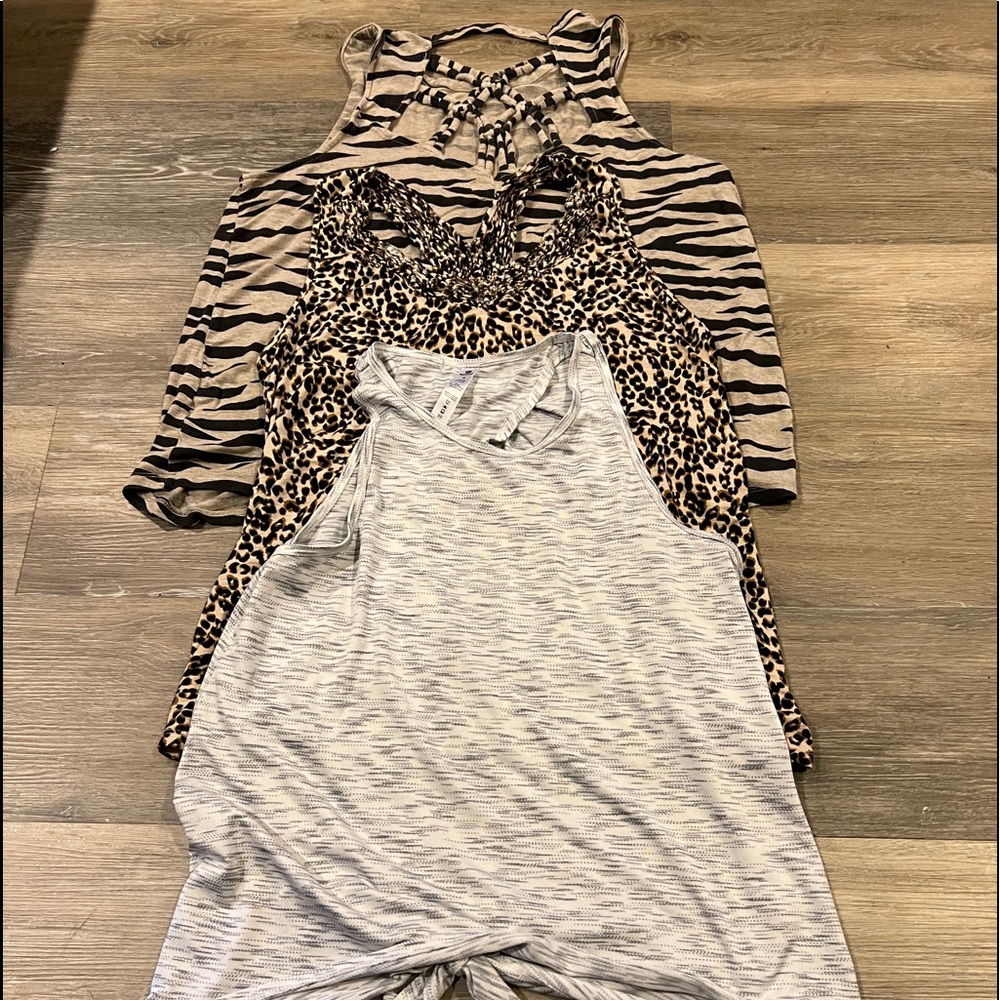 (3) Tank Blouses sold as a lot of (3).